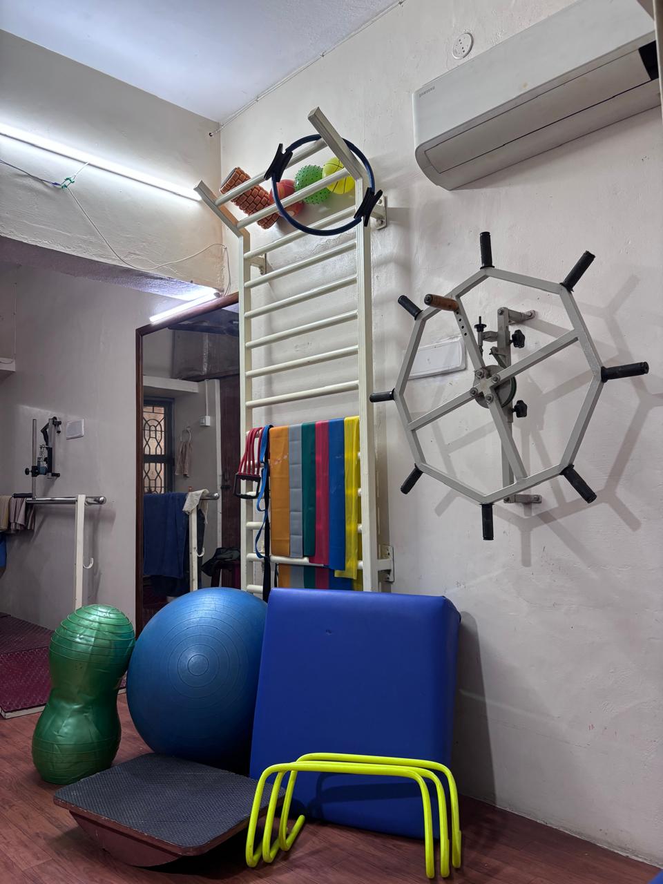 Exercise balls, resistance bands and rehabilitation equipment inside the clinic