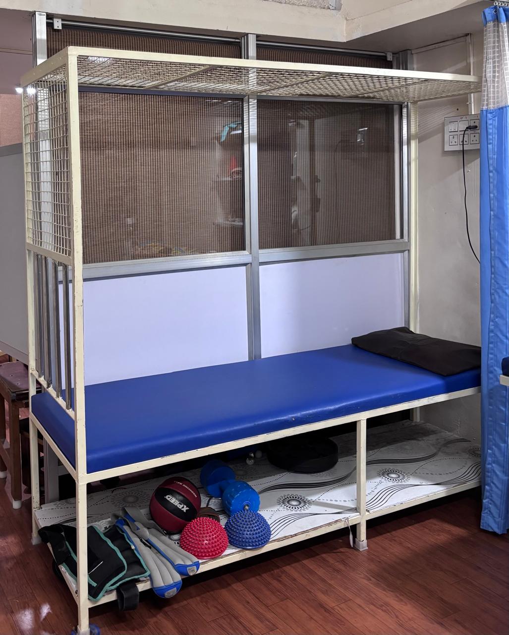 Parallel bars and rehabilitation aids inside Sri Physiotherapy Clinic